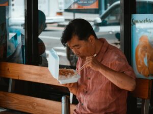 guy eating food 