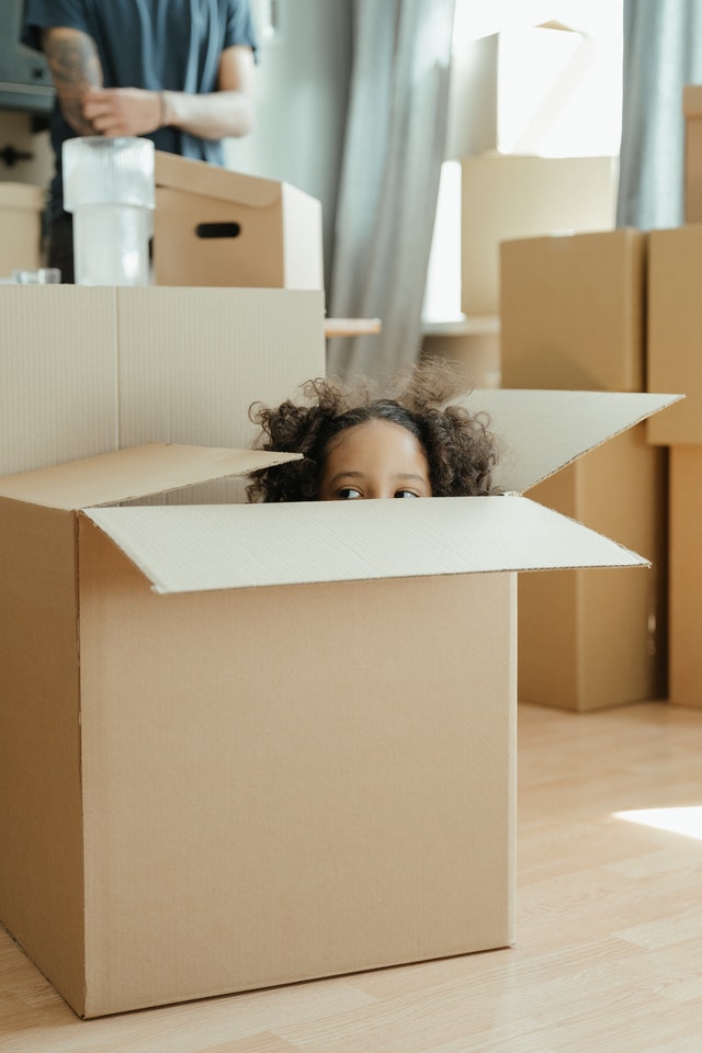 kid hiding in the box