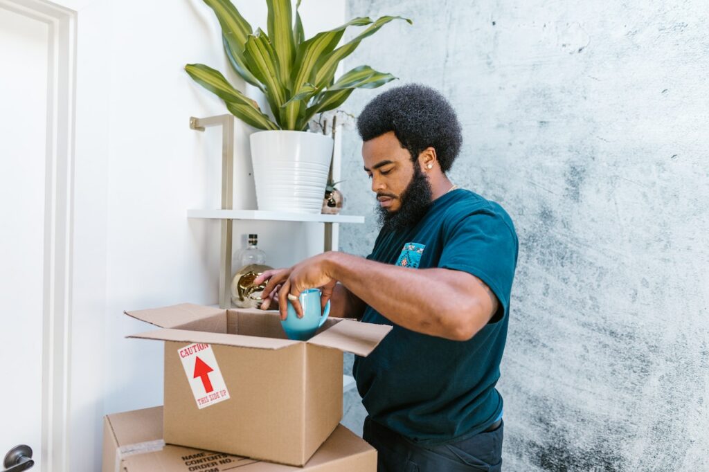 movers packing items in the box